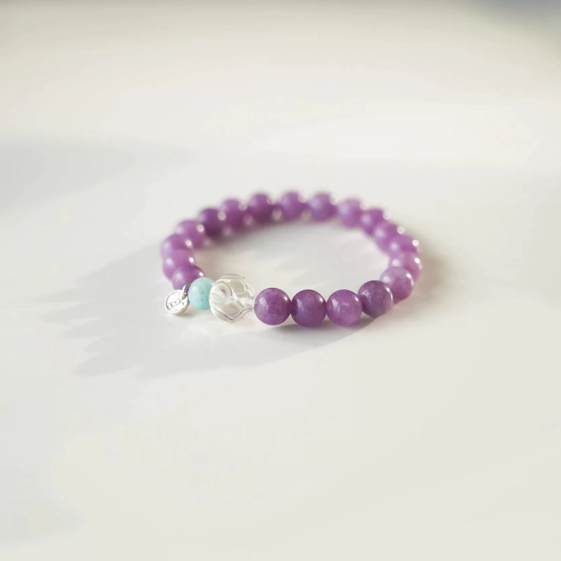 Elegant Amethyst Crystal Bracelet – Natural Purple Gemstone Beads with Turquoise and Clear Quartz Accents
By Luminora